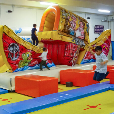 Trampoline park with inflatable